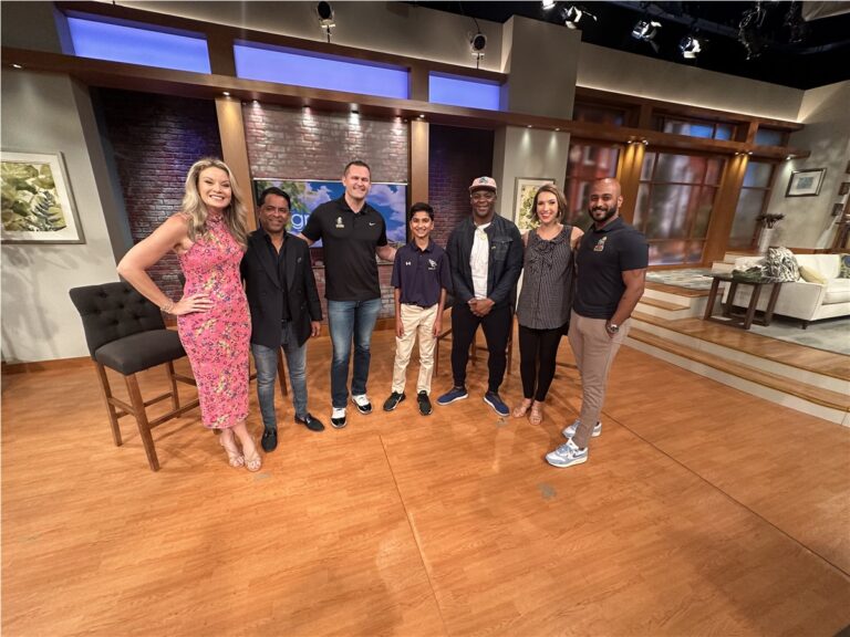 The Panda Exteriors team with the hosts of a TV show on set