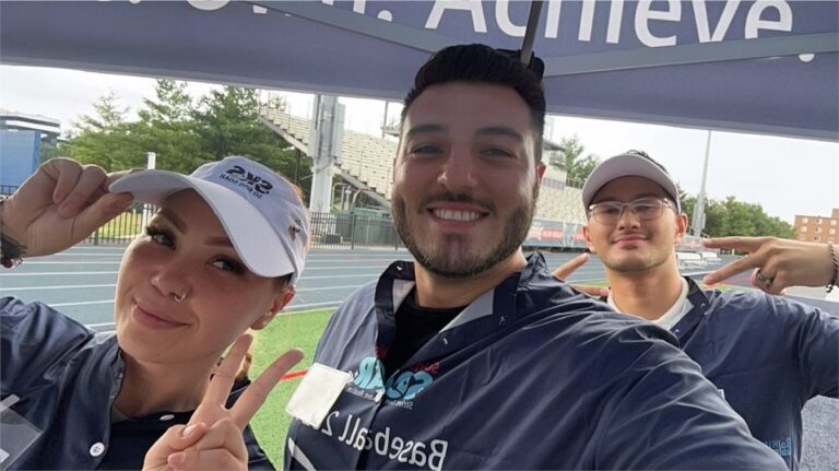 So Kids Soar volunteers taking a selfie at the baseball event
