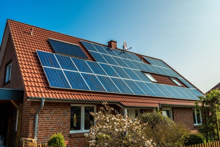 Solar panels on the roof of a brick home