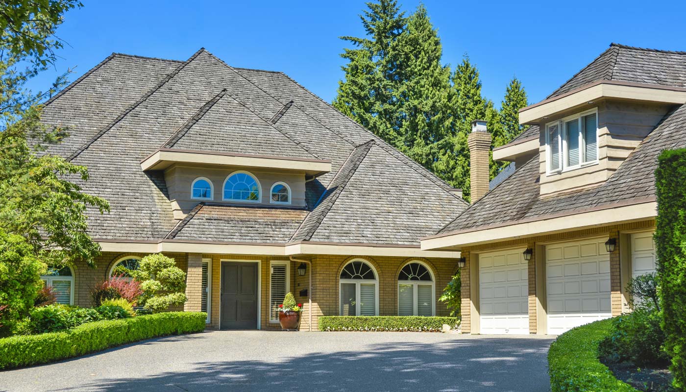 A home with a new roof installed by Panda Exteriors